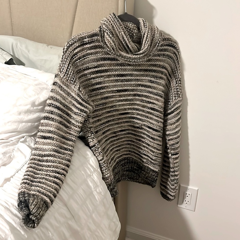 Gently used cozy sweater from Italy.